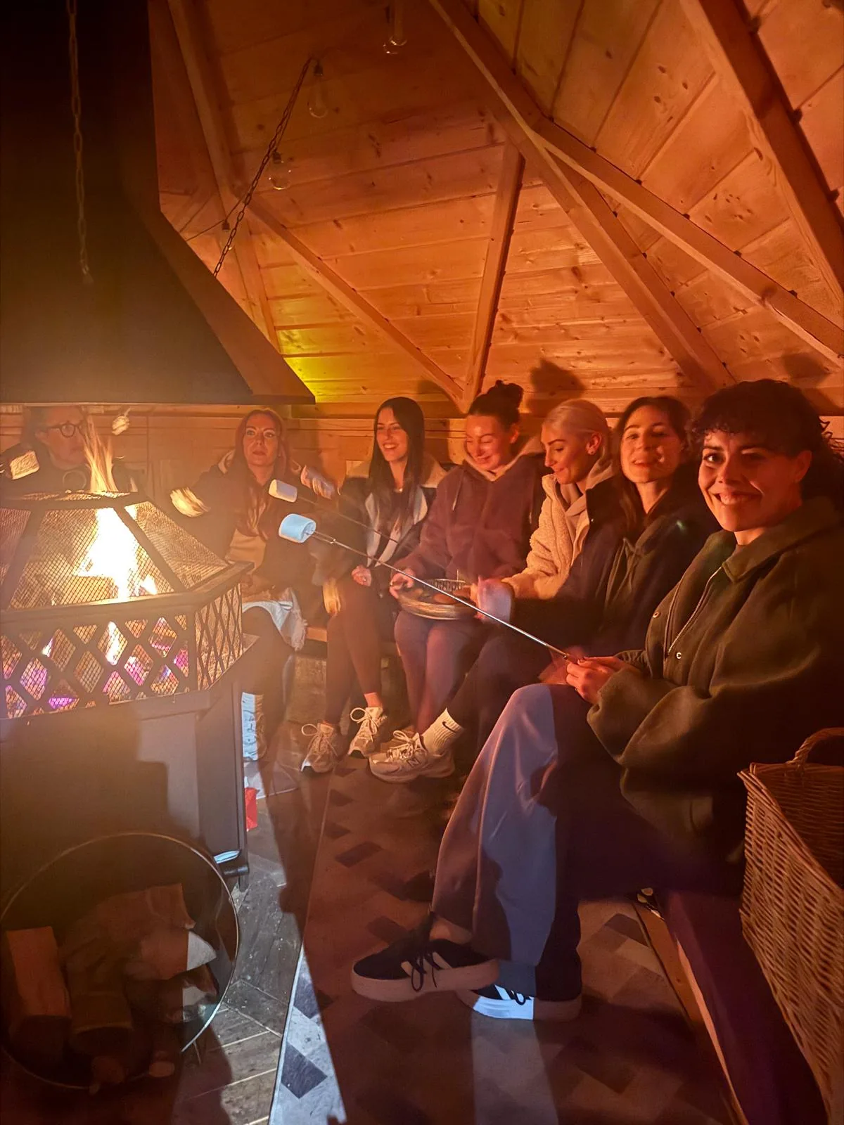 Guests gathered around the fire in the Zen Den, toasting marshmallows at the first Discover Your IKIGAI evening